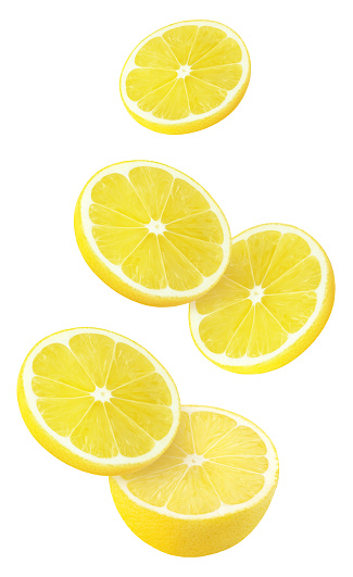 Isolated flying lemons. Falling sliced lemon fruit isolated on white background with clipping path