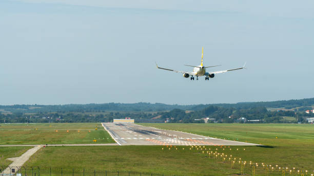 istock Plane approaching landing, landing gear extended 1485088291