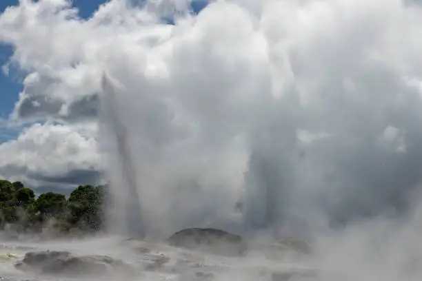 Photo of Pohutu Geyser in the Whakarewarewa Thermal Valley, Rotorua, in the North Island of New Zealand. The geyser is the largest in the southern hemisphere and among the most active in the area