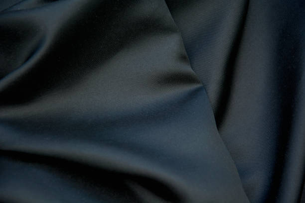 istock Beautiful black satin background close-up in photo studio 1485093931