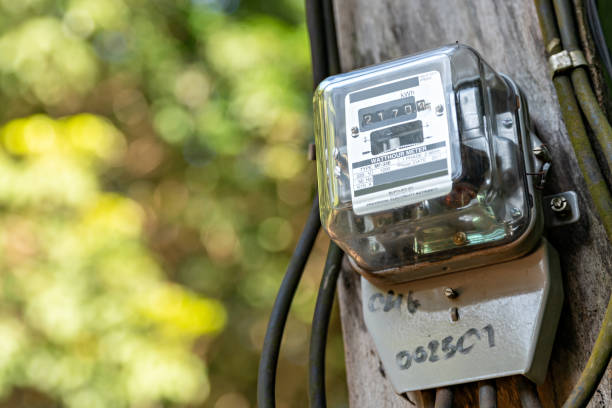 istock Kilowatt hour meter on blur sky background. Electric power meter measuring power usage. Electricity Monitoring Equipment. measument energy consumption. 1485100173