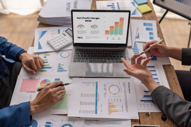 istock Team of Business people working at workplace with tablet and document, doing planning analyzing Tax financial report, business plan investment, finance analysis Economic business discussions. 1485100302