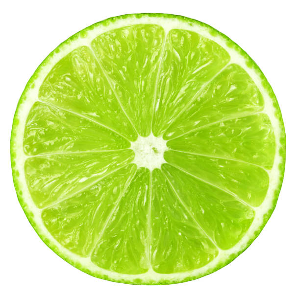 istock Juicy slice of lime isolated on white, with clipping path 1485101106