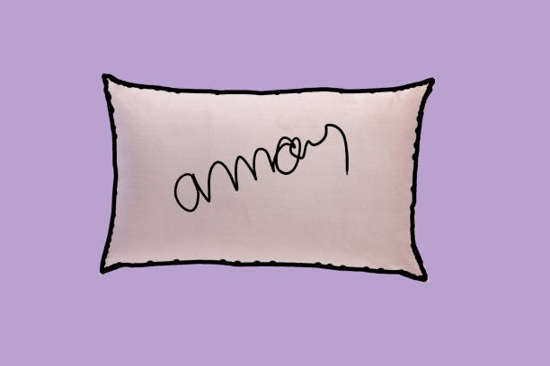 istock square pillow written love with black edges. Bedroom sleeping pillow or sofa cushion with feather, down or synthetic and textile filling, comfort rest fabric pillowcase 1485102856