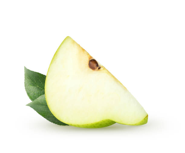 istock Isolated pear slice. Green pear fruit piece (cut) with leaves isolated on white with clipping path 1485104158