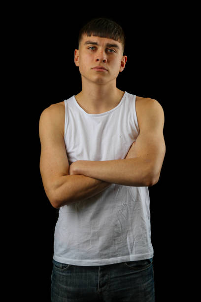 istock Teenage boy in a white sleeveless top 1485107977