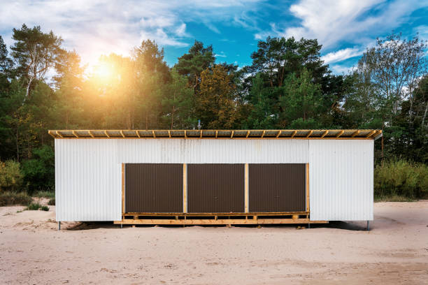 istock Local storage building with closed door on sandy beach 1485112663