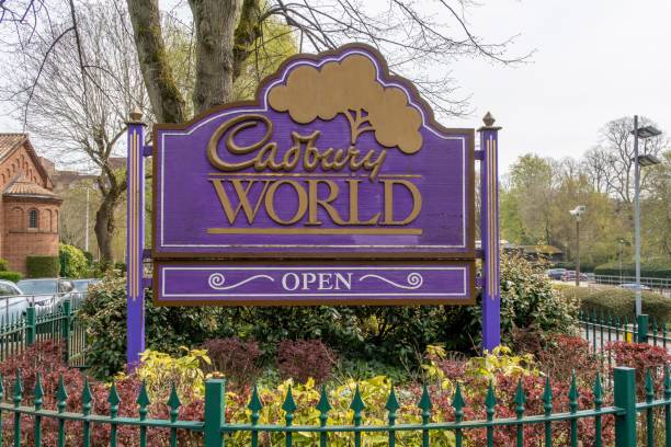 Birmingham, United Kingdom – April 22, 2023: A vibrant purple sign with text: Cadbury World.