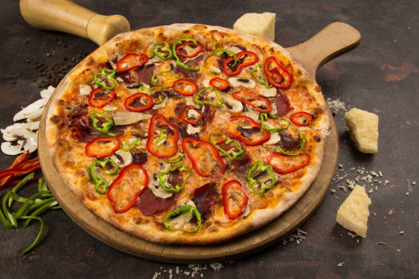 istock vegetable pizza and cheese on the rusty background 1485119361