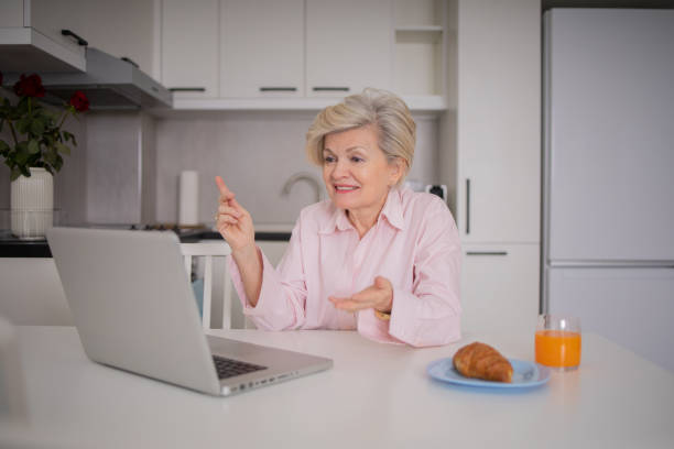 istock Mature woman working from home 1485121327