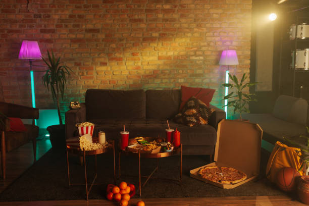 a retro living room with fast food. - neon orange imagens e fotografias de stock