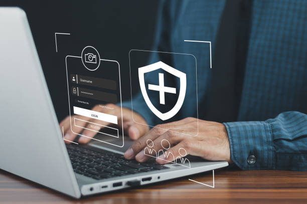 istock Businessman using password Cybersecurity and privacy concepts to protect data. Lock icon internet network security technology. Businessmen protecting personal data on laptop and virtual interfaces. 1485121837