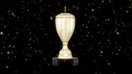 istock Golden trophy award , zoom golden cup , Golden confetti background - stock video 1485122732