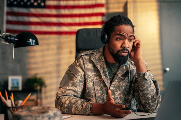 istock Military officer speaking on cellphone in office. 1485123015