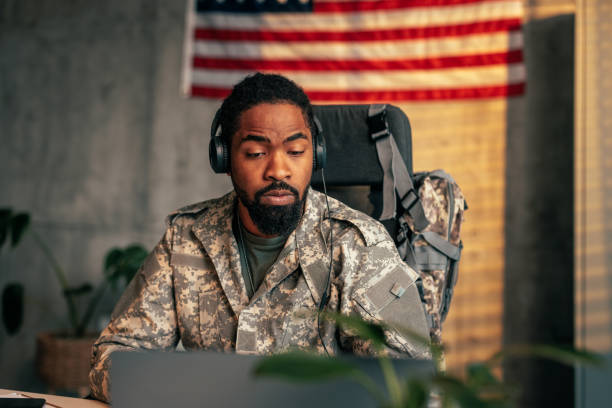 istock Soldier with headphone in office. 1485123022