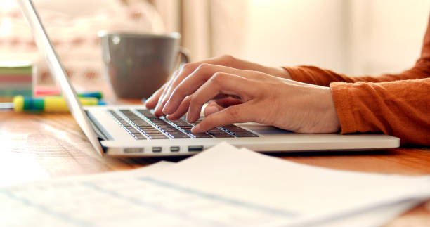 istock Mixed-race female hands texting on laptop keyboard close up. 1485124758