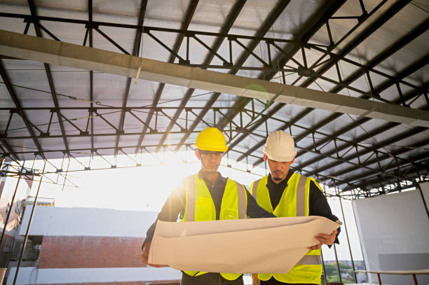 istock Civil Engineer and Construction Supervisor inspect the internal construction of building at construction site. Construction engineers or architect and Foreman inspect the construction inside building. 1485125634