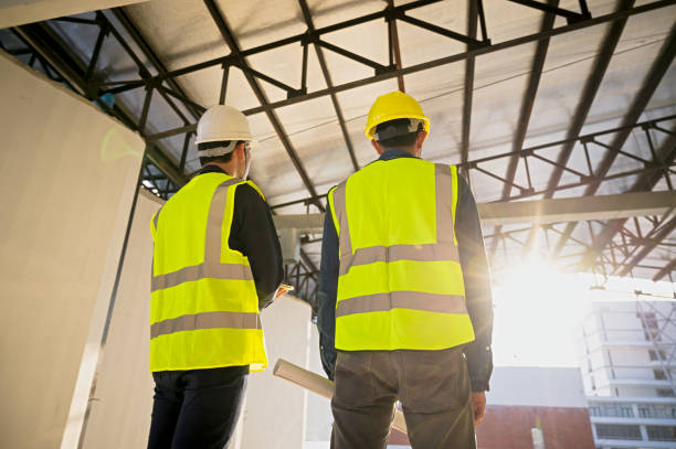 istock Civil Engineer and Construction Supervisor inspect the internal construction of building at construction site. Construction engineers or architect and Foreman inspect the construction inside building. 1485125636