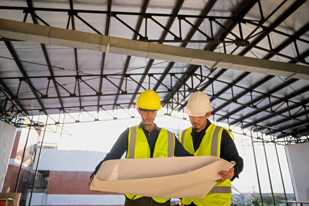 istock Civil Engineer and Construction Supervisor inspect the internal construction of building at construction site. Construction engineers or architect and Foreman inspect the construction inside building. 1485125640