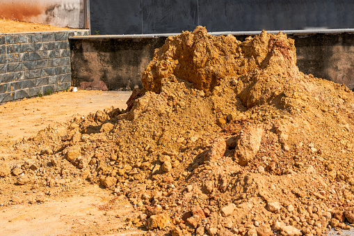 Close-up of a pile of loess mounds at an outdoor construction site