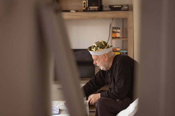 istock Lonely man Sitting in His Apartment 1485129842