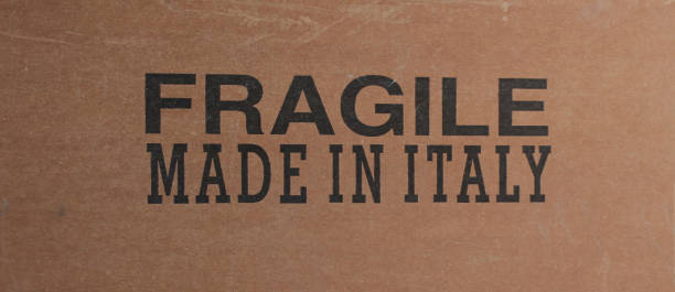 istock Front view of black writing on cardboard from worn packaging 1485130106