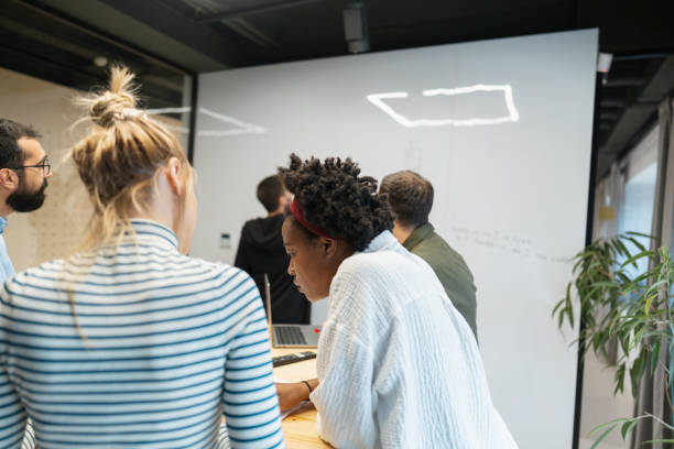 istock Coworkers brainstorming in a meeting 1485131420