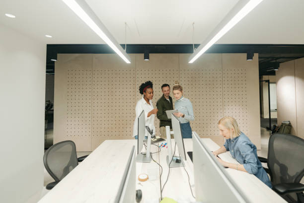 istock Productive coworkers working together in the office environment 1485131498