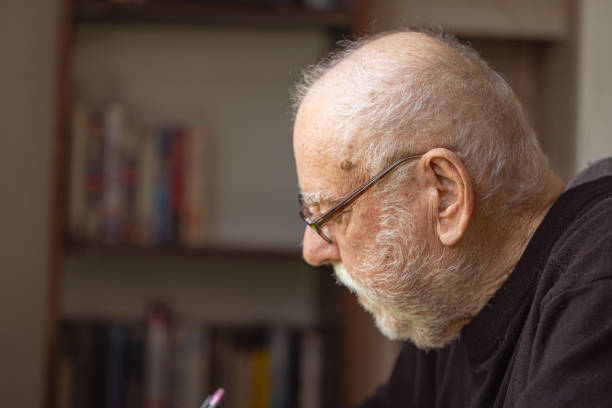 istock Senior Man with Dementia Documenting Life 1485131710