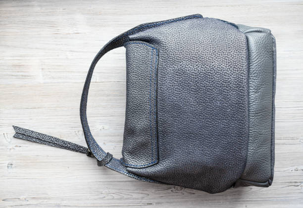 istock handcrafted grey leather handbag on gray table 1485132518