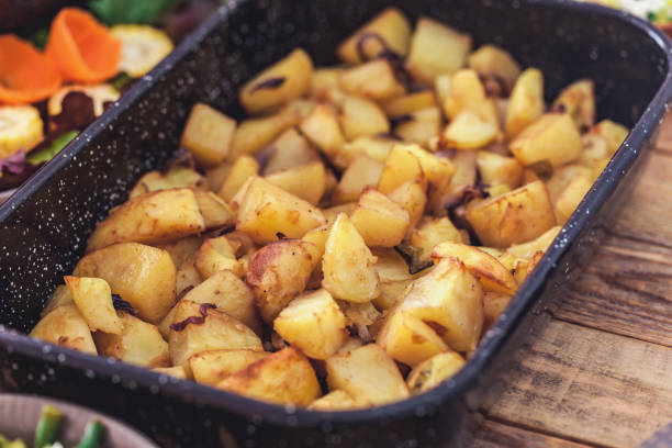 Roast potatoes in baking tray, close-up, no people