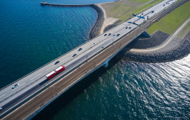 istock Red truck on highway bridge 1485135961