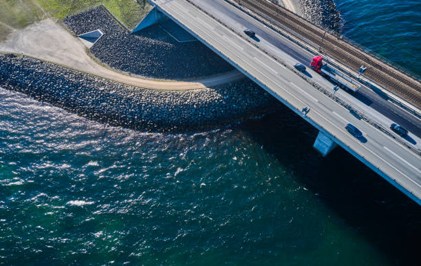 istock Red truck on highway bridge 1485136005