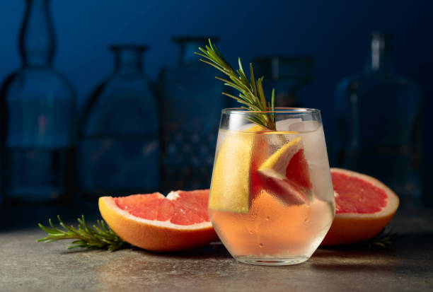 istock Cocktail gin tonic with ice, rosemary, and grapefruit. 1485137493