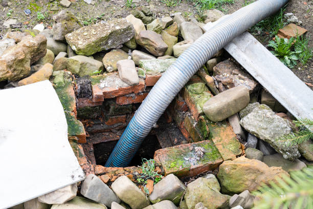 istock corrugated hose pumping out outdoor septic tank 1485137664