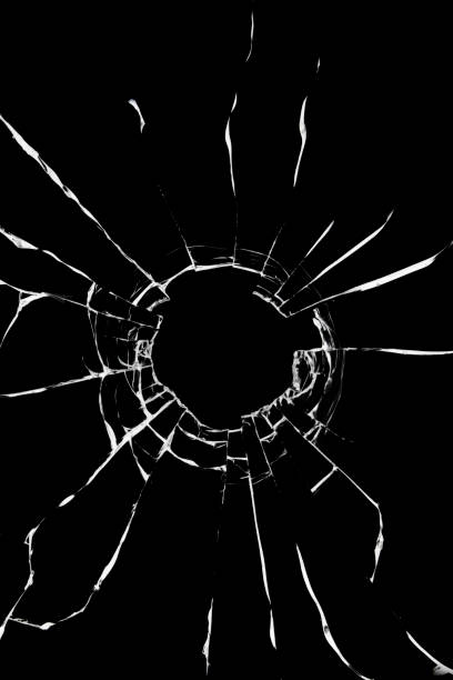 istock Broken window, background of cracked glass. Abstract texture on a black background. 1485142726