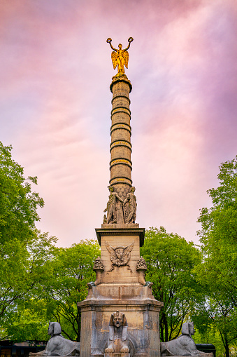 Place du Châtelet, fountain built in 1808 with the Victory statue on top in Paris, France