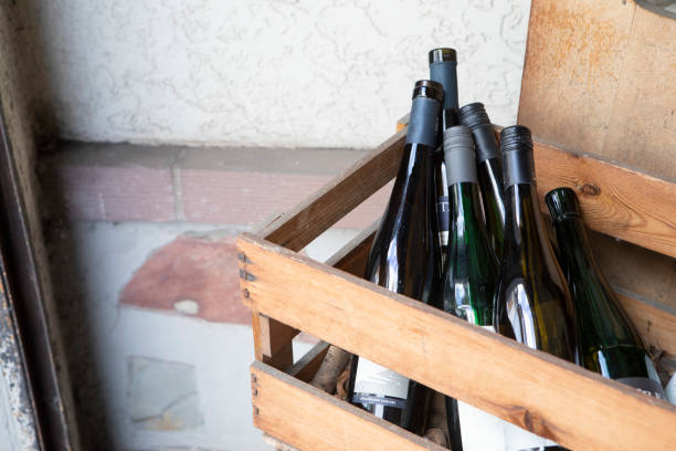istock Empty bottles of wine in a wooden crate 1485144332