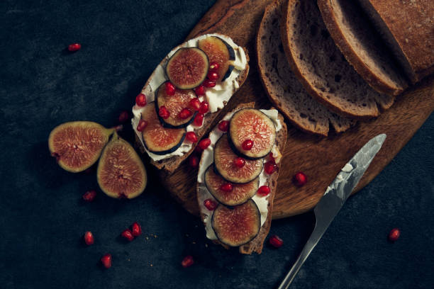istock slices of rye bread with figs and pomegranate 1485145115