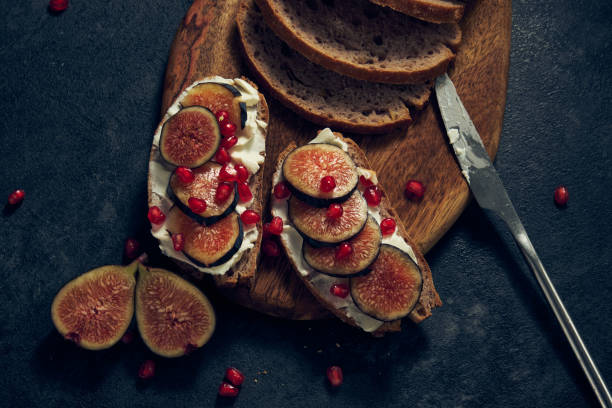 istock slices of rye bread with figs and pomegranate 1485145164