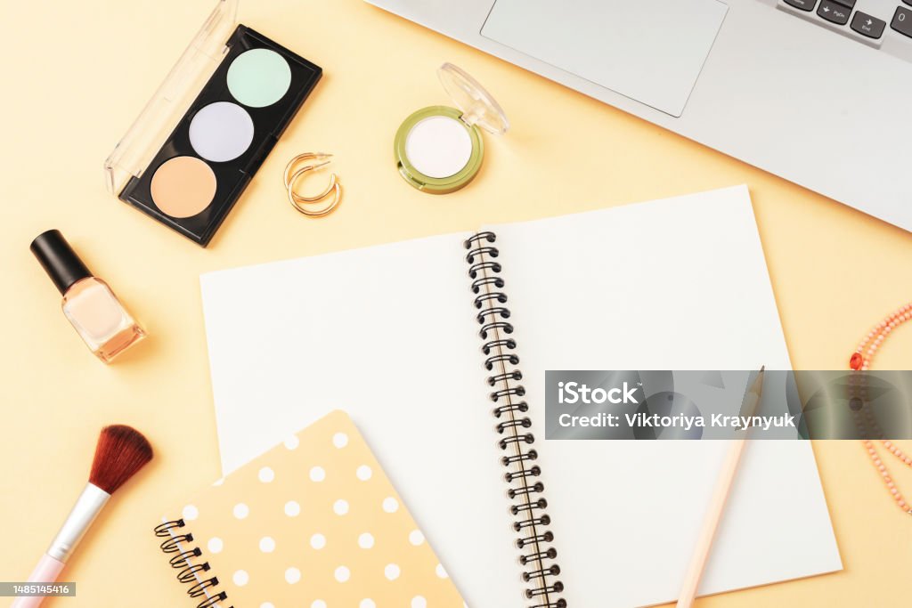 Makeup Theme Notepad Blank Notepad Makeup Cosmetics And Laptop Computer On Beige Background ...