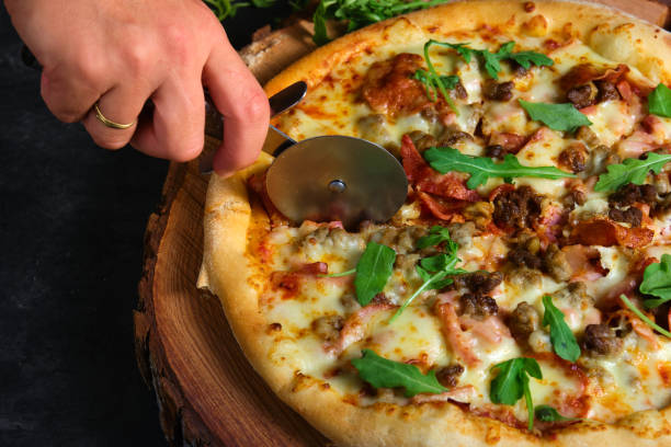 istock delicious hot pizza on the board 1485145621