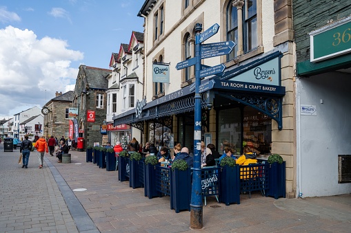 Saint-Brieuc, France, June 29, 2022 - People on Rue Saint-Guillaume, a shopping street in Saint-Brieuc