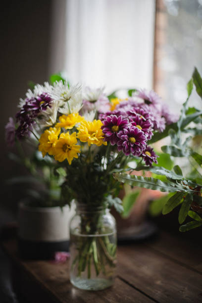 Flower bouquet near a window