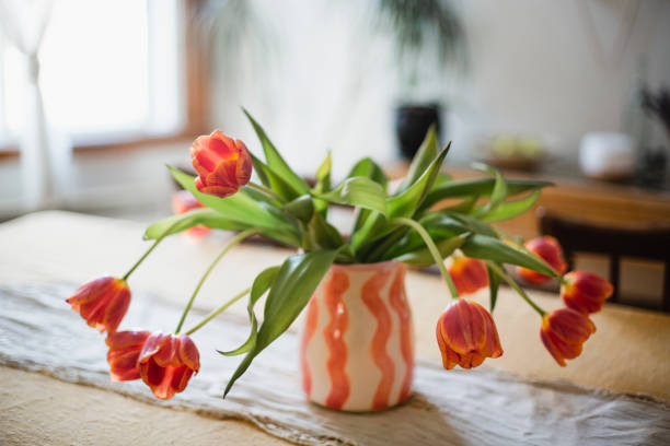 istock Orange tulips in a vase 1485147419