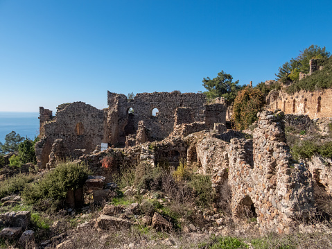 Ruins of the ancient city of Syedra, located on the slope of the Taurus Mountains at the 20th kilometer of the Alanya-Gazipasa highway, Mediterranean coast, South Turkey, on a sunny day