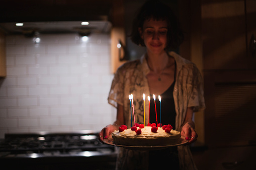 Birthday cake, birthday candle, one person,