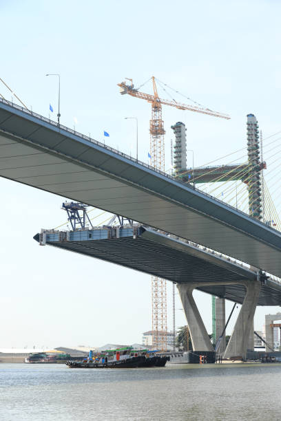 istock Suspension bridge under construction.  The bridge cross over Chao Phraya River in Bangkok Thailand. 1485157984