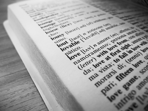 Focus on the word Love inside a dictionary