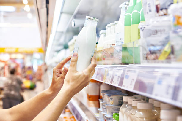istock Woman shopping milk 1485167389